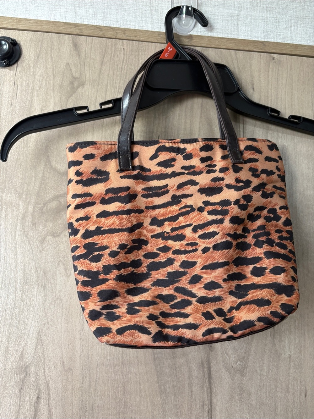 Estee Lauder Leopard-Print Tote in Tan and Black with Brown Handles
